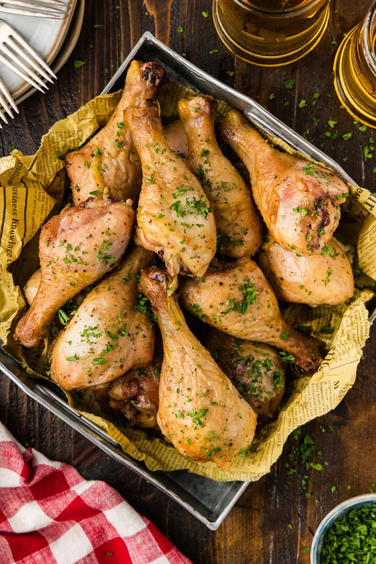smoked chicken legs in a metal tray