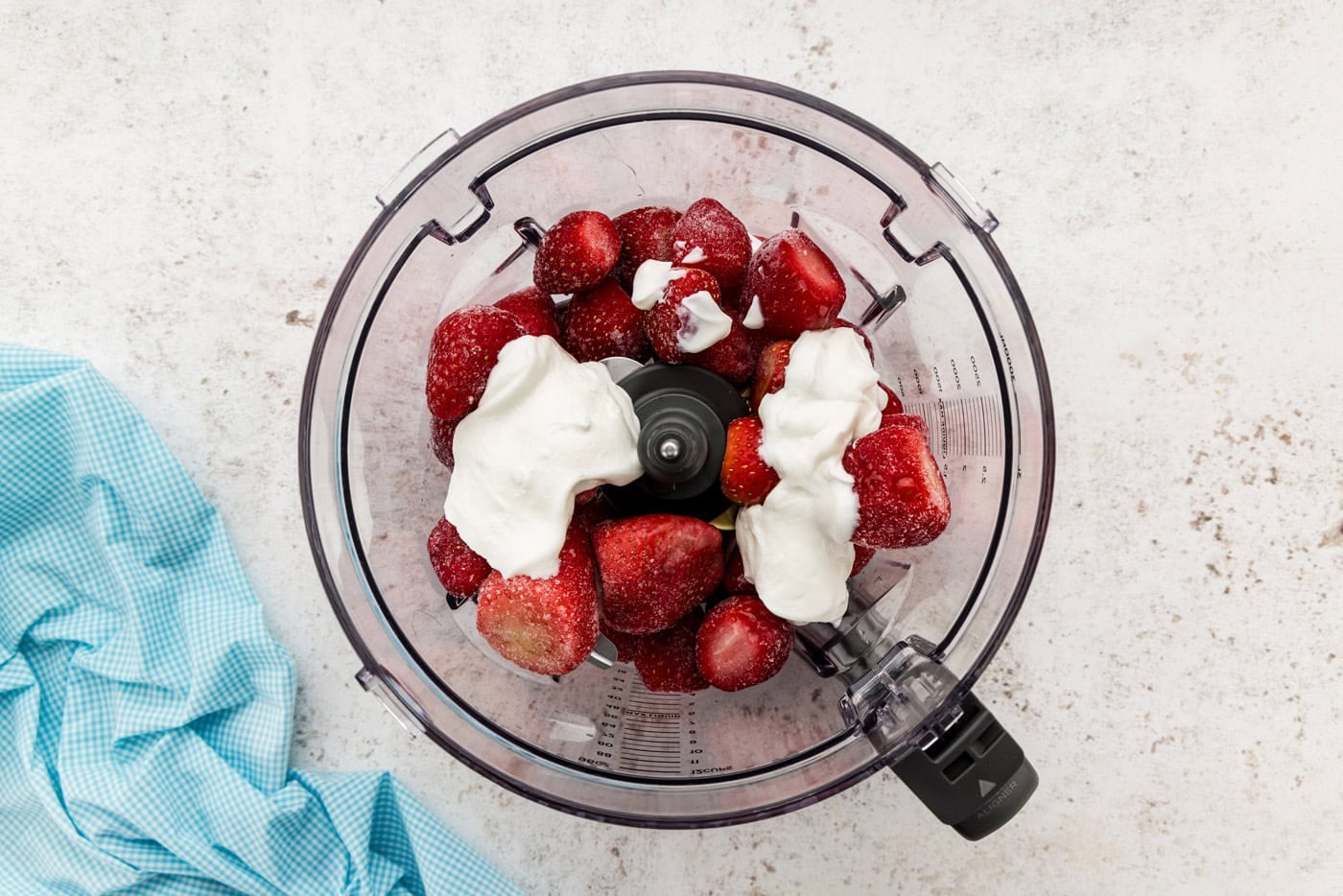 frozen strawberries and yogurt in food processor