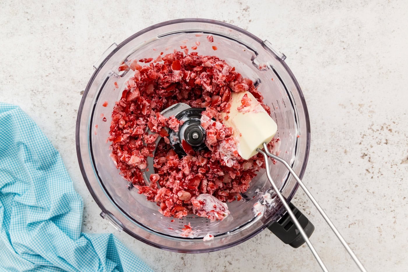 processed frozen strawberries in food processor