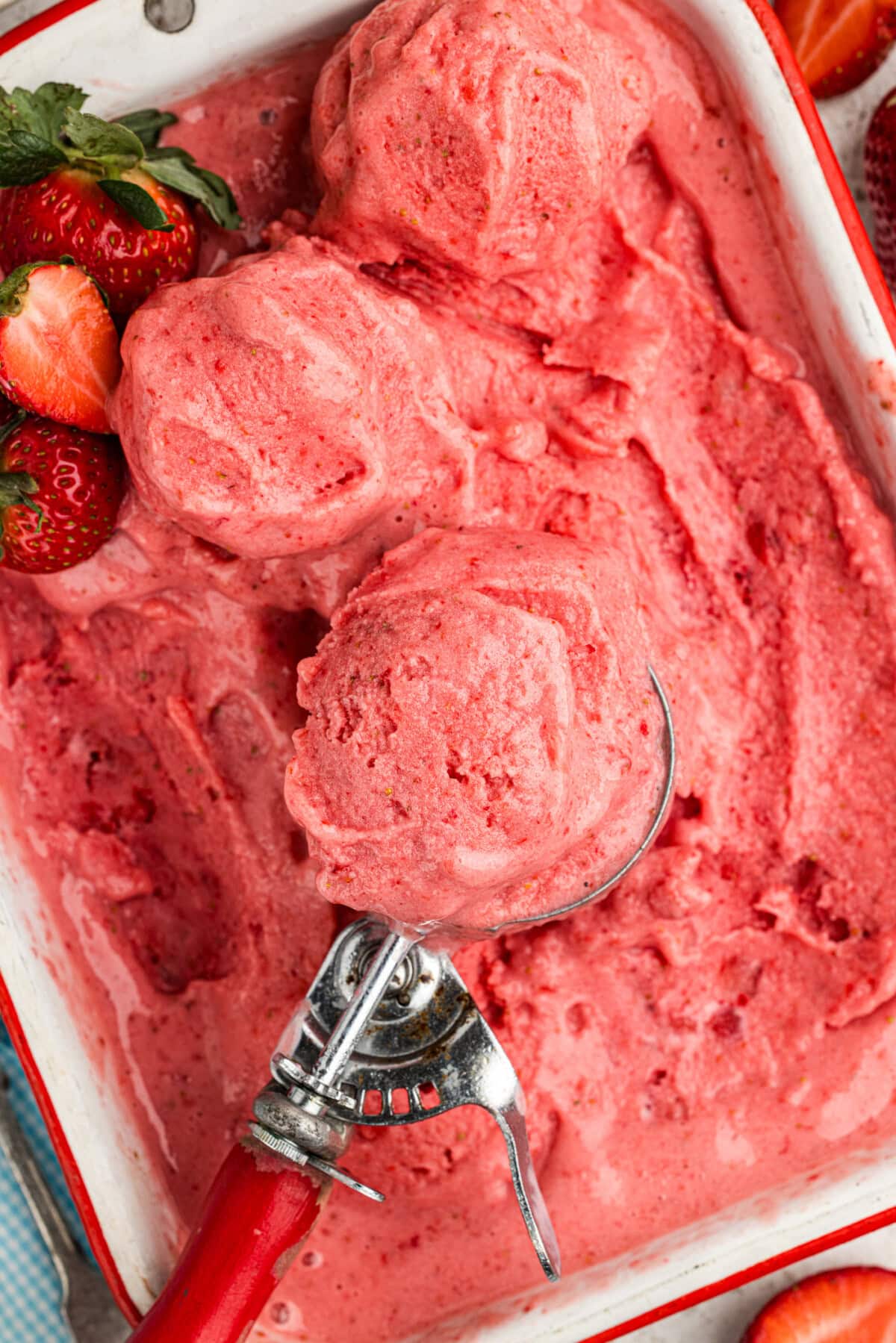 overhead photo of Strawberry Frozen Yogurt with an ice cream scoop