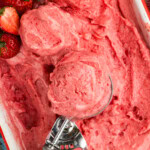 overhead photo of Strawberry Frozen Yogurt with an ice cream scoop