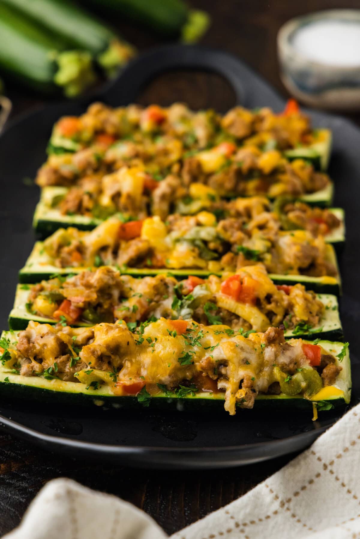 head on view of lined up Stuffed zucchini boats