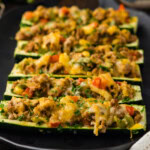 head on view of lined up Stuffed zucchini boats