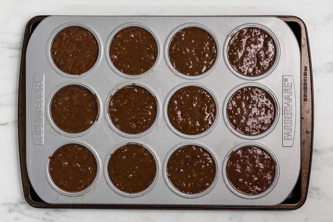 batter in muffin tin