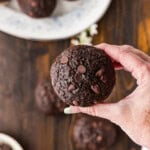 hand holding a Double Chocolate Zucchini Muffin