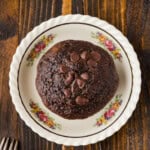 single Double Chocolate Zucchini Muffin on a small plate