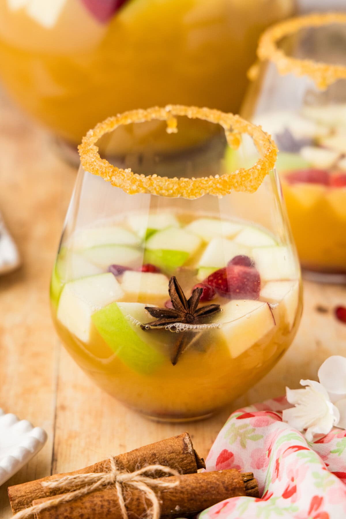 Apple Cider Sangria in a stemless wine glass
