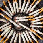 Halloween Cigarette Pretzels in an "ashtray" of cookie crumbs