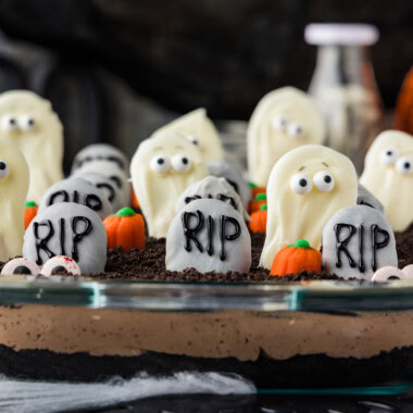 Halloween dirt cake with cookie tombstones and white chocolate ghosts