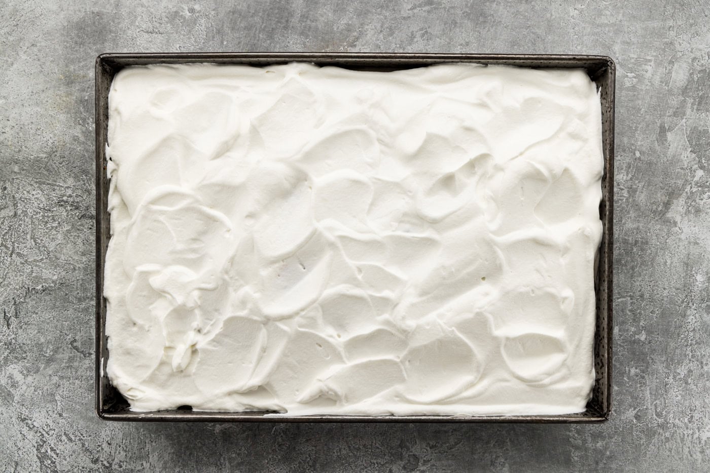 cake with whipped cream topping