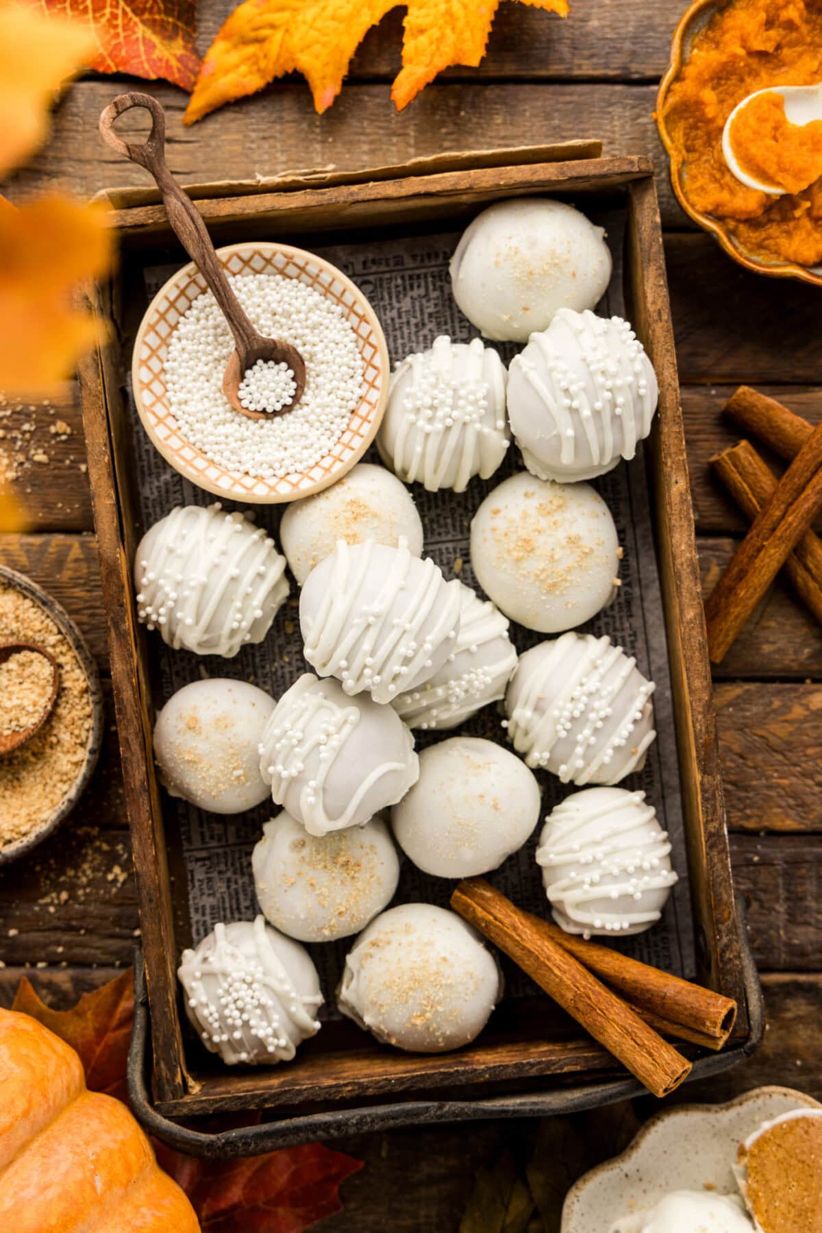 tray of drizzled white chocolate coated Pumpkin Truffles