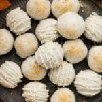 plate of drizzled white chocolate coated Pumpkin Truffles