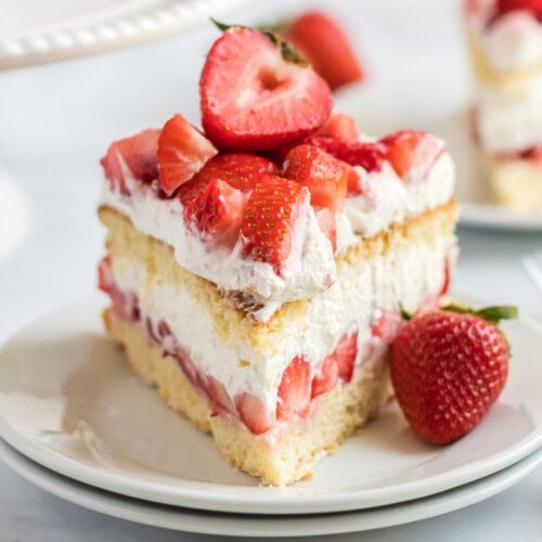 slice of strawberry shortcake cake on a plate
