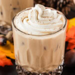 Close up of a creamy fall mudslide with a swirl of whipped cream dusted with pumpkin pie spice